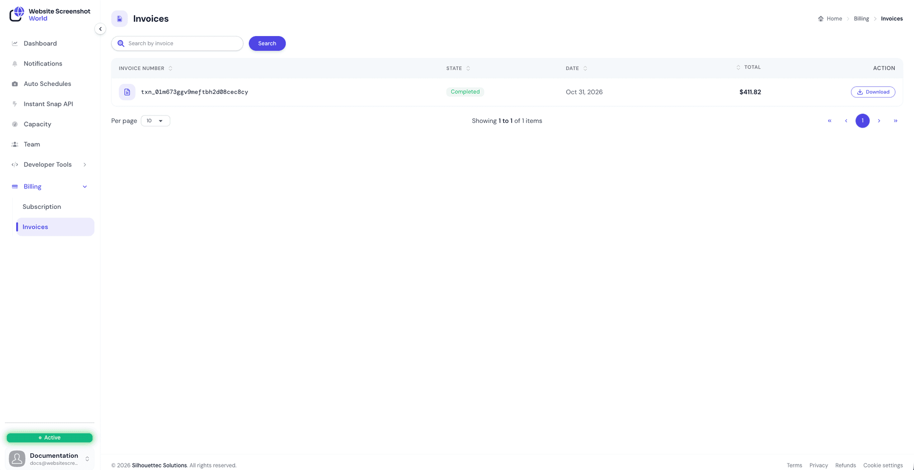 The Invoices list with one completed invoice, its date, total and Download action